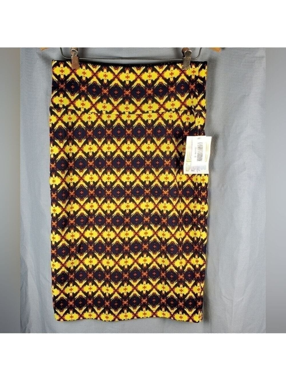 NWT Lularoe Cassie, yellow/black/orange pattern, size S